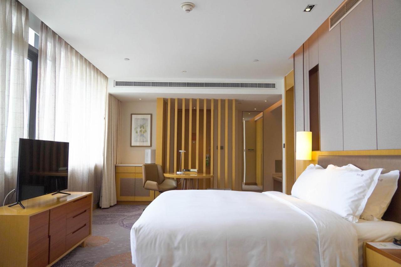 Holiday Inn Tianjin Xiqing By Ihg Exterior foto